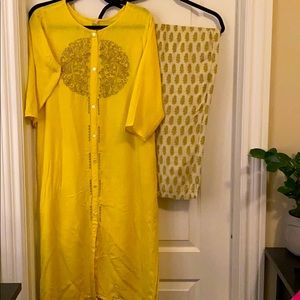 Two piece traditional Indian Kurta and Trousers.
